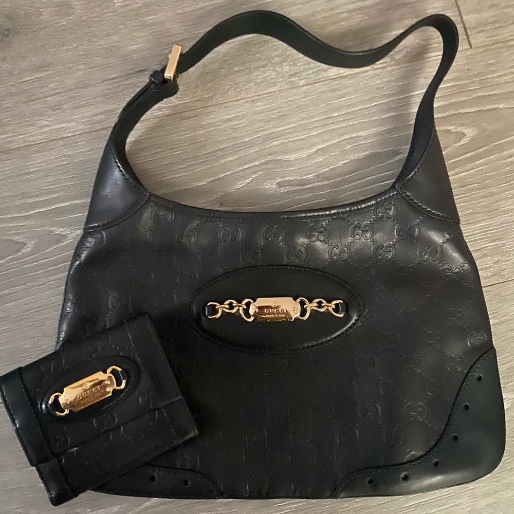Gucci black leather shoulder bag and wallet gold
